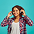 cute-young-woman-in-headphones-positive-emotion-BDNGWDN