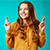 young-optimistic-woman-smiling-with-her-fibgers-cr-R5YXYD4